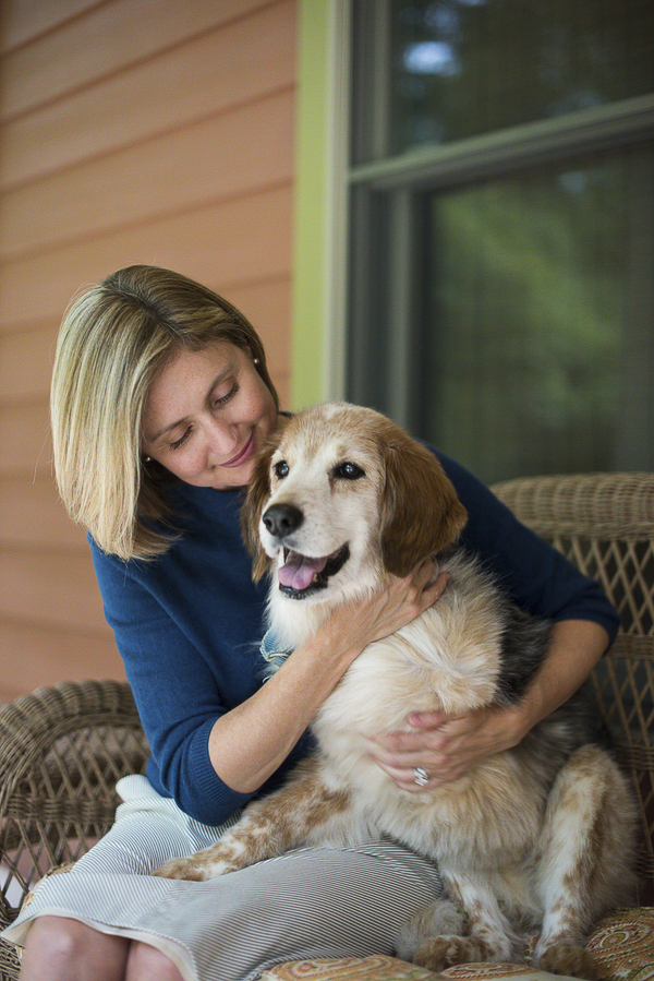 © Laura Matthews Photography | woman, senior dog on porch, 3 legged dog, tripawd