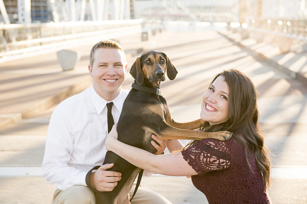 Engagement photos with black and tan coon hound/beagle mix
