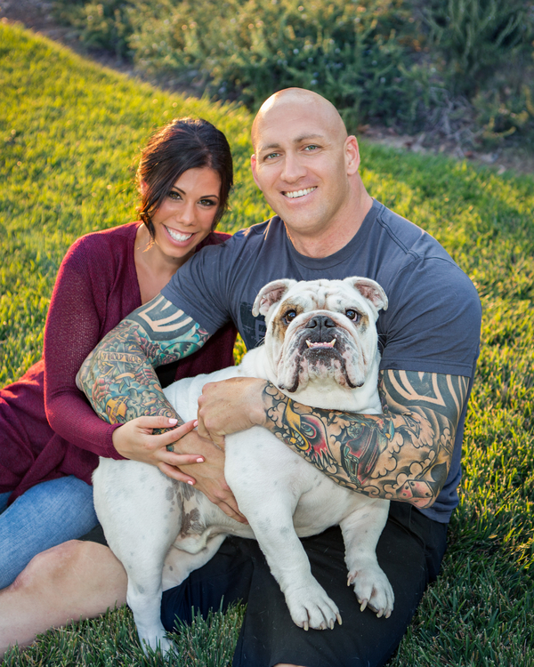 pretty brunette, jacked guy, tattoos, English bulldog, engagement photos with dogs
