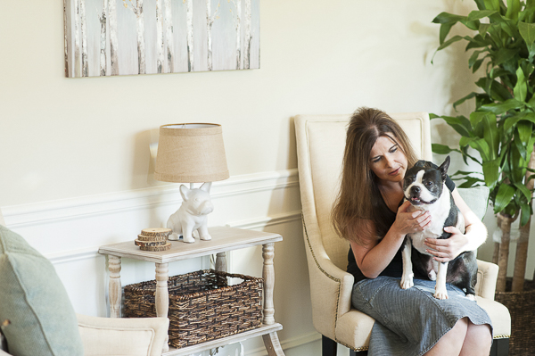 interior design, Boston Terrier sitting in woman's lap