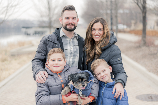 family and dog in winter coats, lifestyle engagement portraits with kids