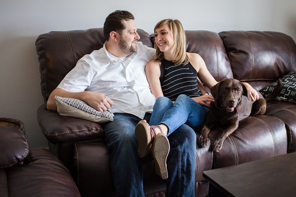 couple relaxing on sofa with dog, ©Clicking Through Life