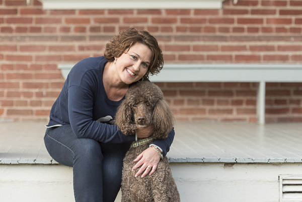 woman and her brown Poodle, dog photography