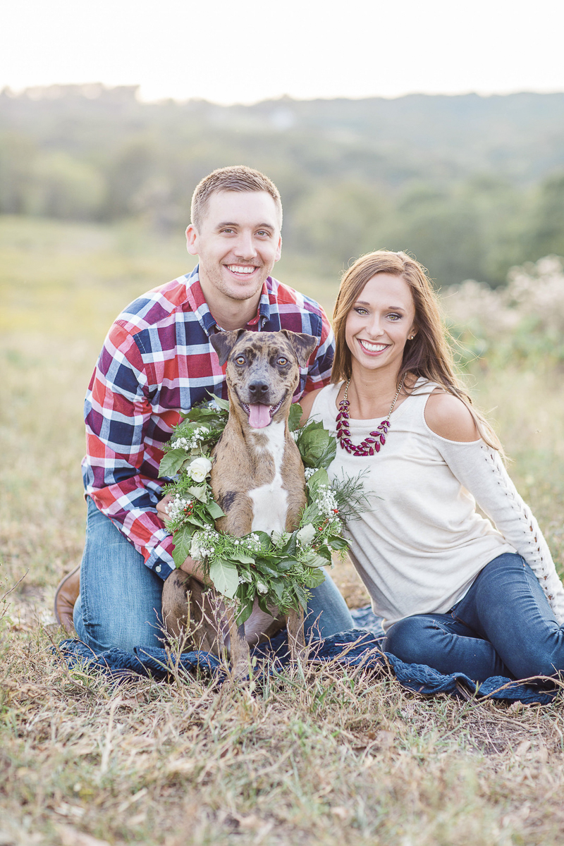 happy dog and engaged couple in countryside, ©Rochelle Maples Photography | Engagement photos with dog