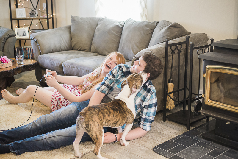 couple playing video games on the floor, dog, ©Laurie Jean Photography | lifestyle dog photography