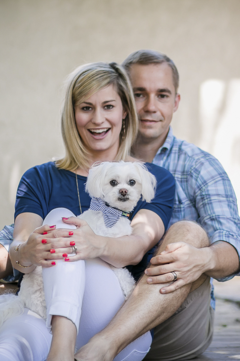 little white dog in woman's lap, family photos with a dog, ©Images by Amber Robinson- Raleigh anniversary photos with dog