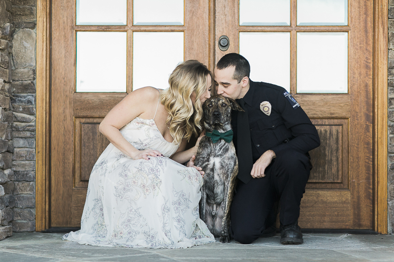 couple kissing their dog on the head, ©Sidney Leigh Photography | dog friendly engagement session