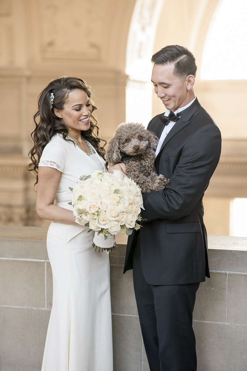 gorgeous bride and groom with toy poodle, wedding dog, ©Holly D Photography | dog friendly SF City Hall wedding