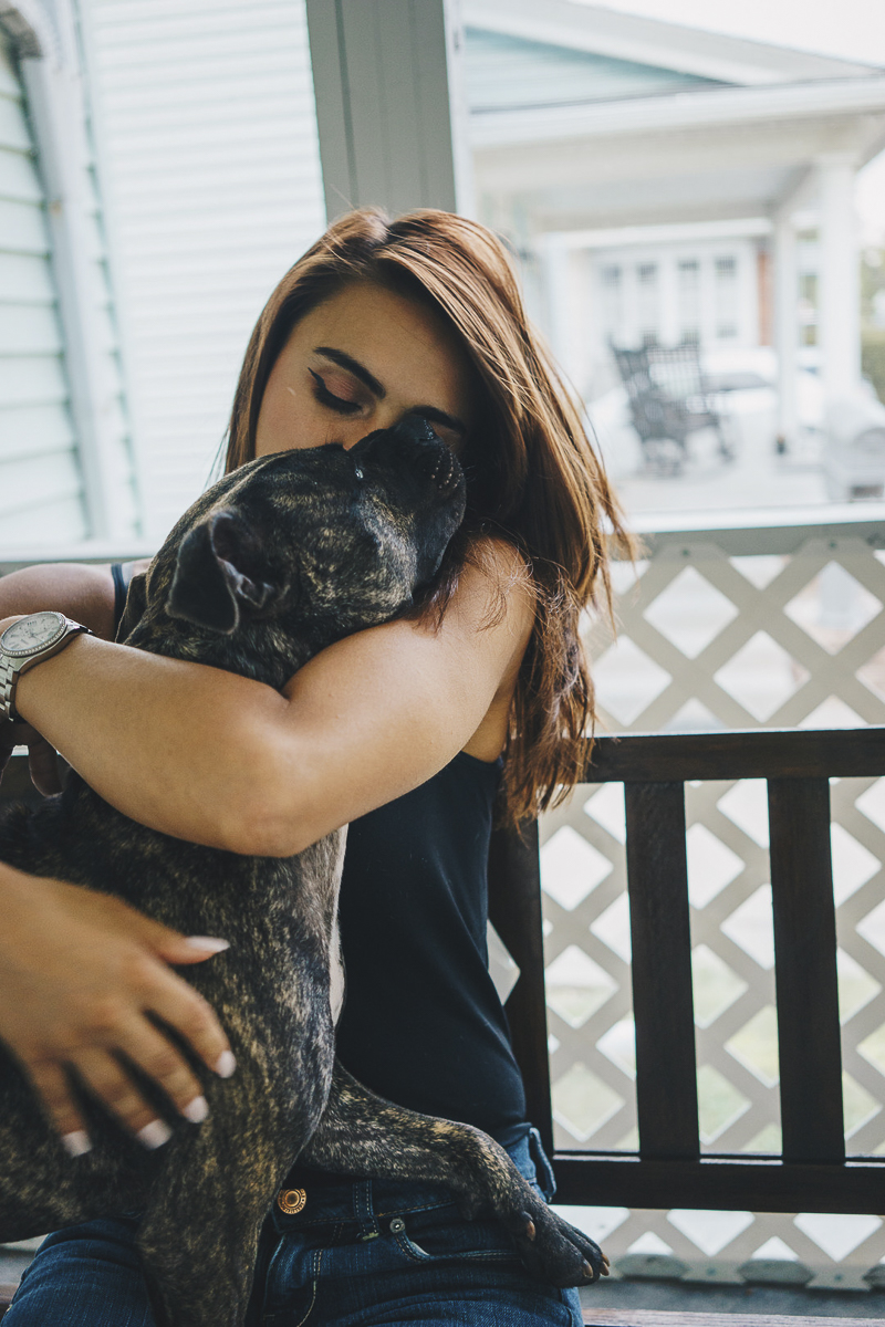 young woman snuggling with her dog, Pit bulls are great pets, | ©Heck Designs and Photography