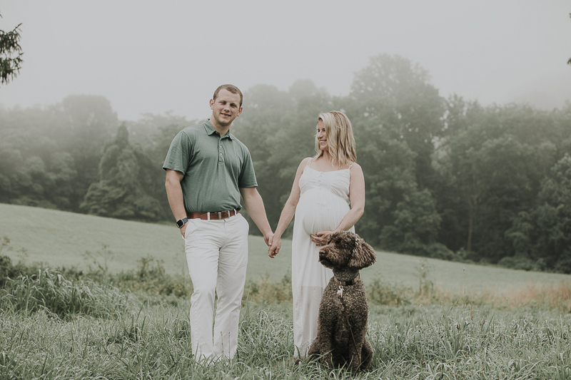 couple holding hands, handsome dog, sunrise session, muted greens, ©Kelli Wilke Photography | dog-friendly maternity session