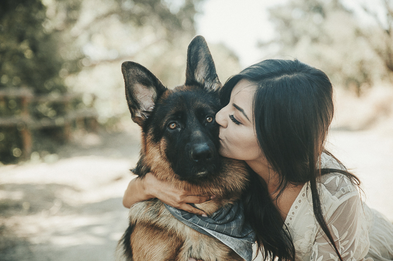 woman kissing GSD, love between people and dogs, ©Wanderlust Photography