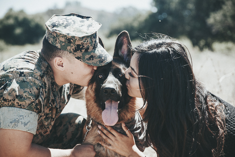 Marine kissing German Shepherd, ©Wanderlust Photography| Camp Pendleton dog-friendly family portraits, 