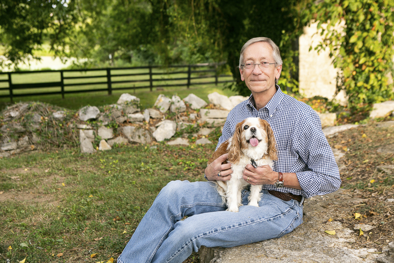 man holding his senior dog, Cavalier Rescue | ©Mandy Whitley Photography | Nashville lifestyle dog portraits 