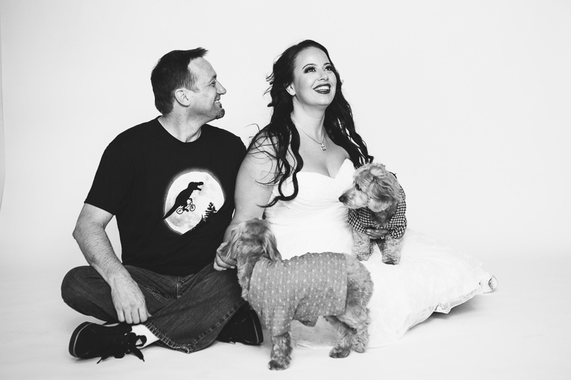 couple and their dogs wearing casual outfits, ©Nicole Caldwell Photography | dog-friendly studio engagement photos