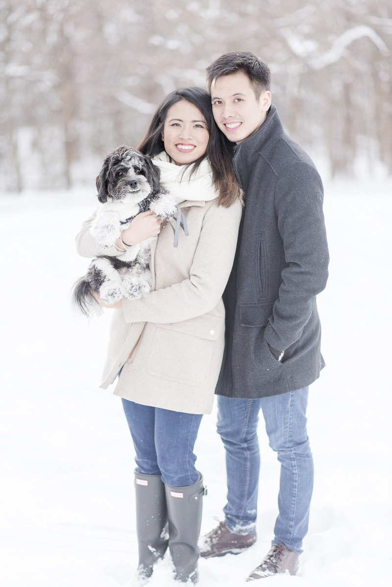 ©Rebecca Sigety Photography | snowy engagement photos with a dog, Reston, VA, woman holding small dog