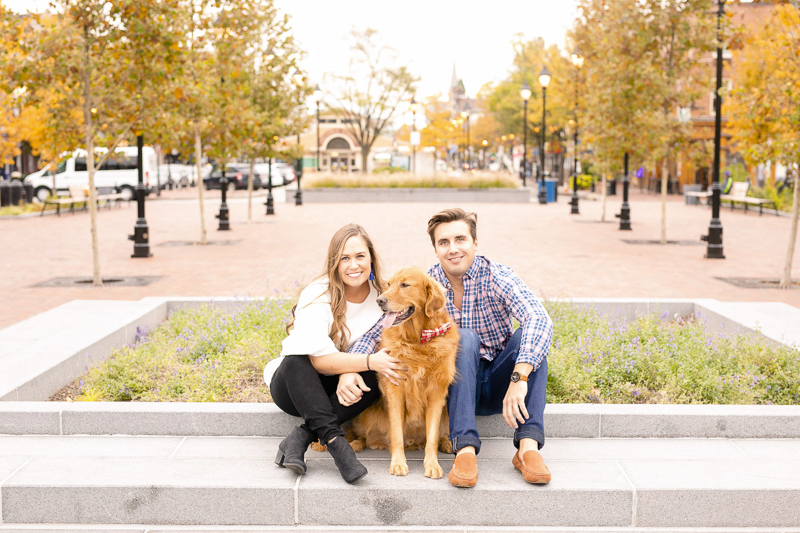 couple and their dog sitting on planter, engagment pictures with a dog, ©Amanda McPhee Studios |