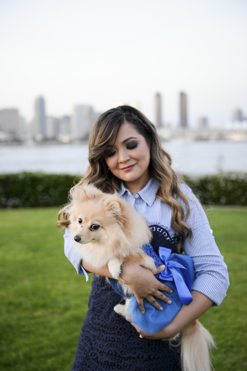 Pomeranian wearing blue dress, woman holding fur baby, ©CR Photography | dog-friendly family photos, Coronado