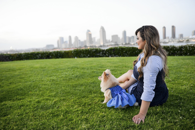 woman and Pomeranian taking in the view, ©CR Photography | dog-friendly graduation photos