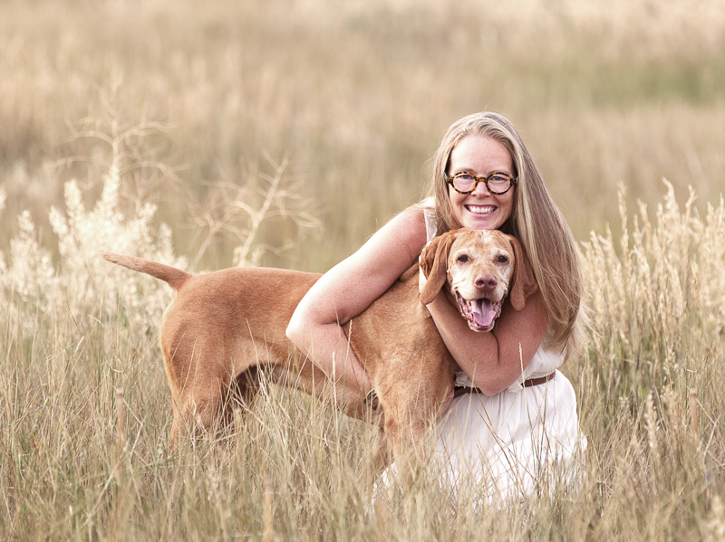 dog inspires woman to change her life, love between dog and human, woman hugging Vizsla, ©Good Morrow Photography