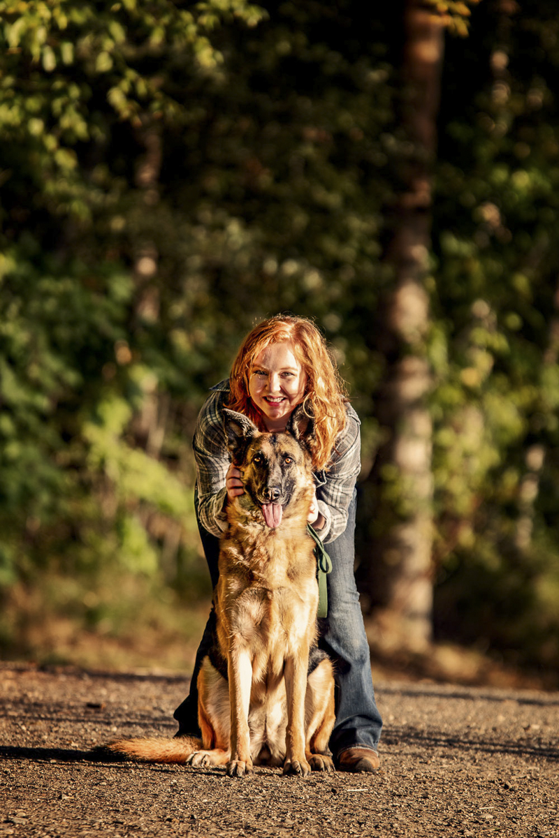 redhead woman and her German Shepherd in forest, ©Noses and Toes Photography, Spokane lifestyle dog photography