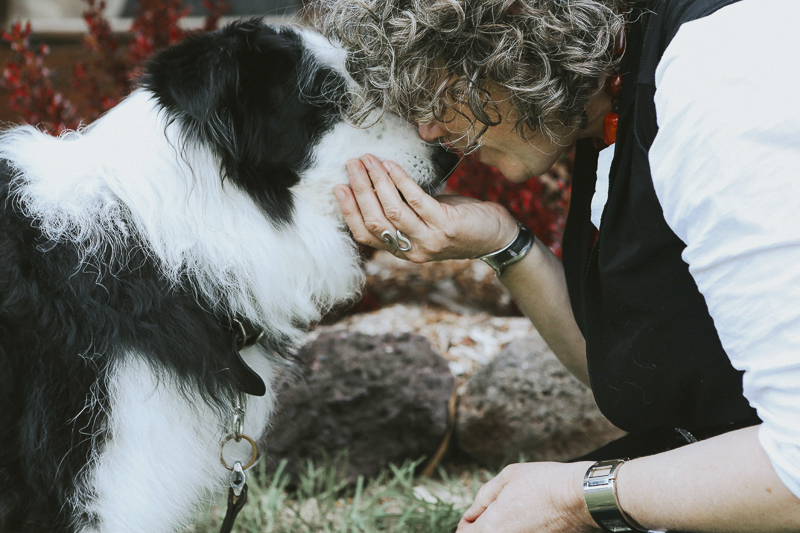 woman and her Border Collie nose to nose, documenting love between dogs and humans, ©Dogfolk