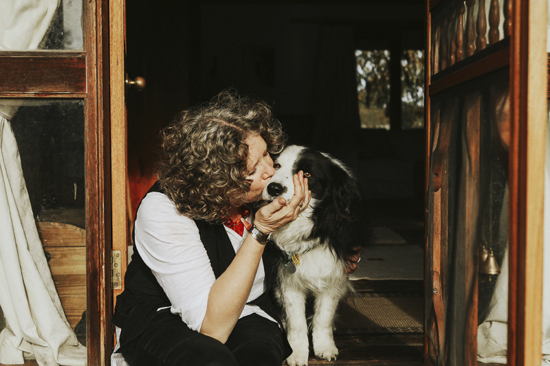 woman kissing her dog, heartwarming photos of cancer survivor and her dog, ©Dogfolk | Melbourne Pet Photographer | Storyteller - in home dog photography