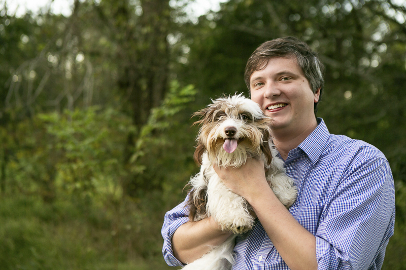man holding his puppy, piebald dachshund,, © Mandy Whitley Photography | on location dog photography