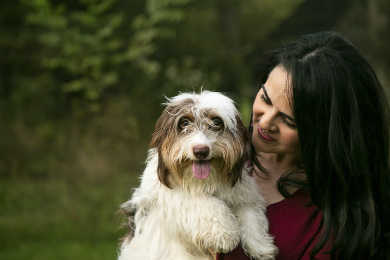 woman holding cute long haired Dachshund, © Mandy Whitley Photography | Nashville lifestyle dog photographer