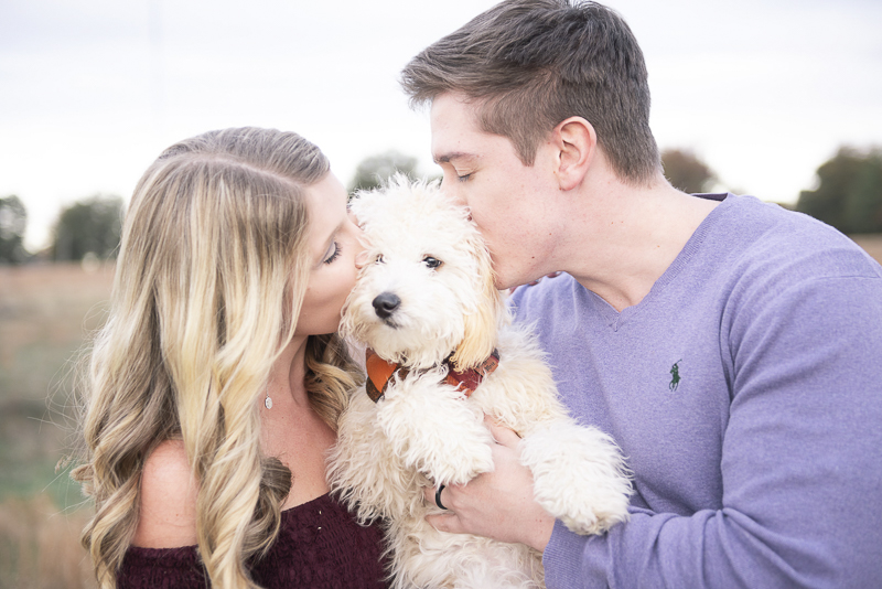 young couple and their Labradoodle puppy, ©Persuasion Photography | 