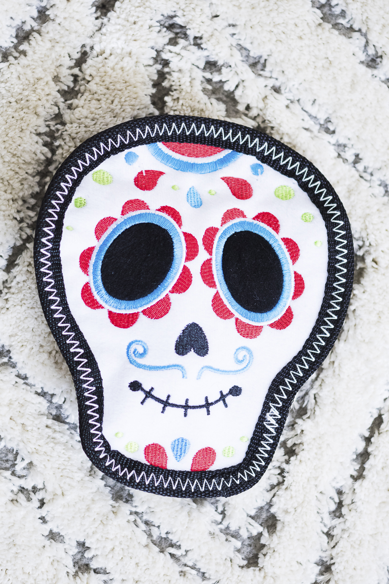 ZippyPaws Fiesta Storybook Sugar skull dog toy for aggressive chewers