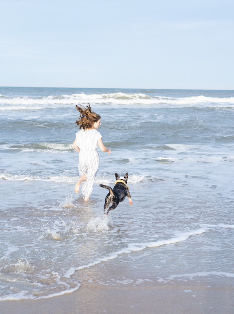 life is better with a dog, woman and dog playing in ocean, ©1416 Photography, Marineland Beach Florida