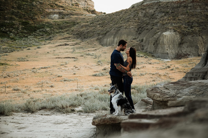 couple and their dog in scenic landscape, ©Jackie Hall Photography