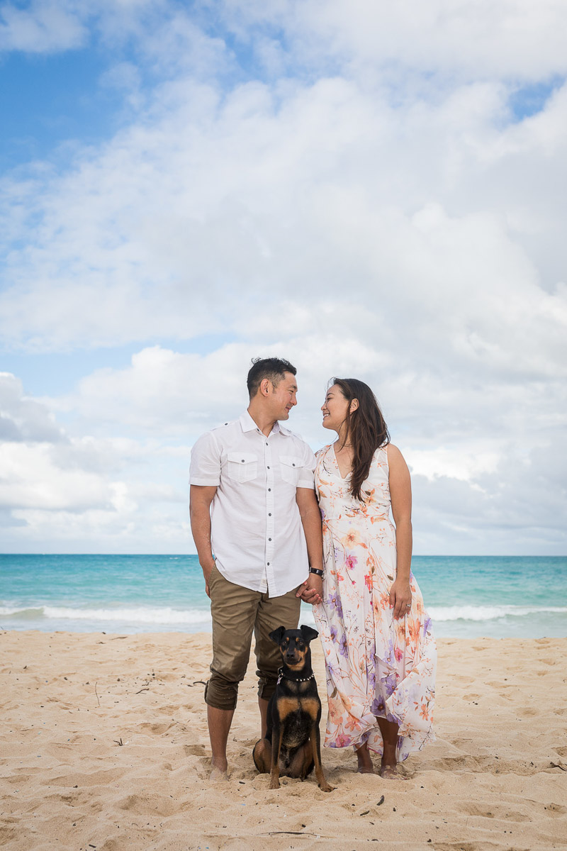 ways to include dog in engagement photos, ©VIVIDFotos | dog-friendly engagement photos, Waimanalo, Hawaii