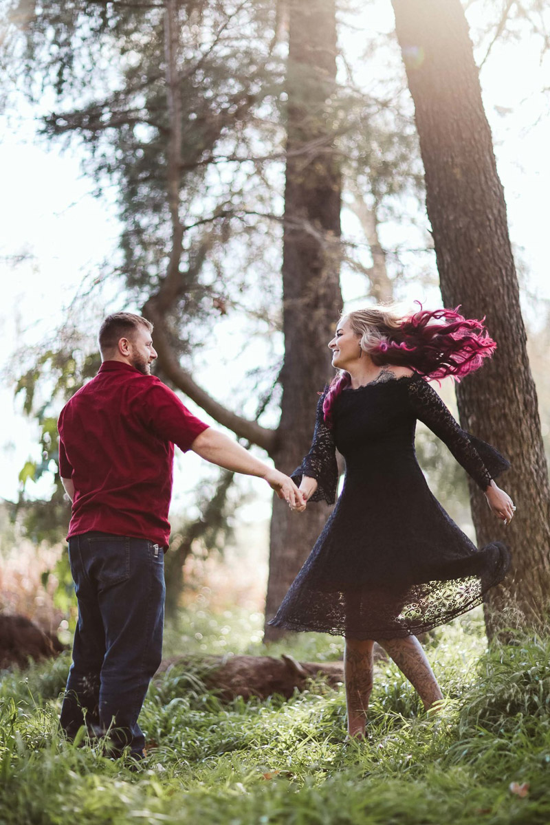 couple dancing under the trees, Irvine, CA engagement photos | ©Playful Soul Photography