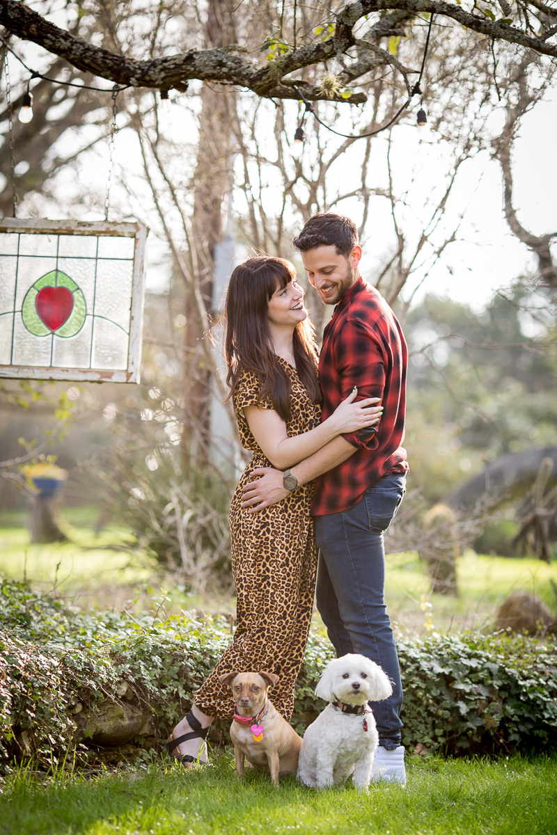outdoor engagement pictures with dogs, ©Wildflower Barn Photography, Driftwood, Texas