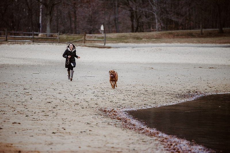 dog and human running in the sand©Erin Cynthia Photography - Lifestyle dog photography