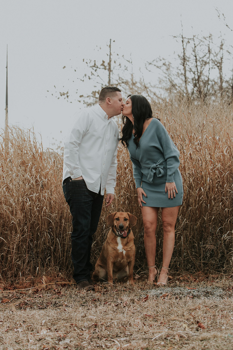 winter engagement portraits with a dog, ©Kelli Wilke Photography