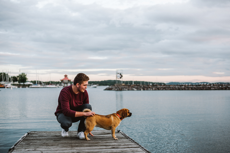 man and dog on dock, lifestyle pet photography, Burlington waterfront, ©Mei Lin Barral Photography