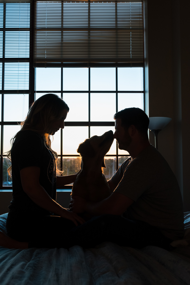 humans and dog silhouette, loft style window, modern on location pet-friendly photographer, ©Alice G Patterson Photography - Syracuse 