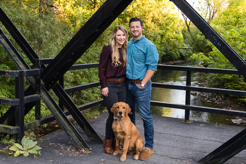 Golden Retriever and humans on bridge, on location family photos, Syracuse NY | ©Alice G Patterson Photography