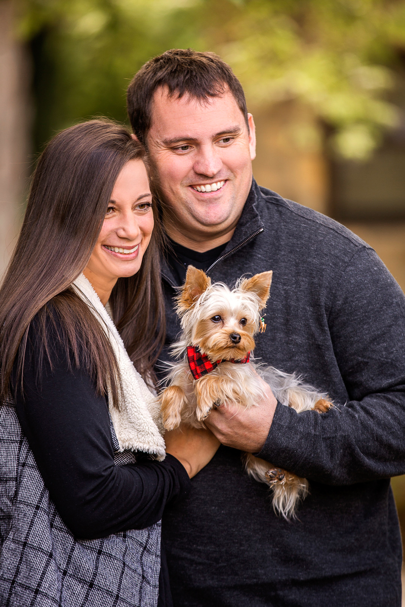 couple holding Yorkie, ©Cariad Photography | dog-friendly engagement session, Clayton, GA