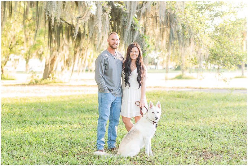 southern engagement session with a white husky/shepherd mix | ©Kayce Stork Photography | dog-friendly engagement session | Biloxi, MS