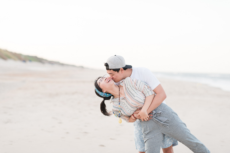 fun engagement pose ideas, beach photography session | ©Michelle & Sara Photography, Outer Banks, NC
