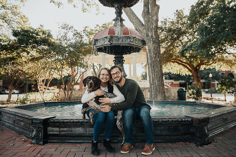 German Shorthaired Pointer in woman's lap, dog-friendly engagement photos | Joshua and Parisa | Austin Wedding Photographer and Videographer