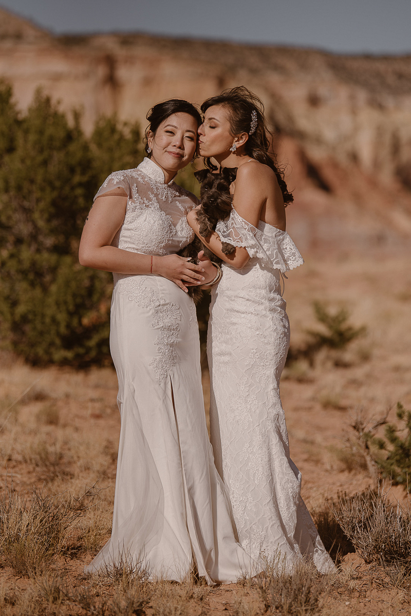 two brides and their dog, LGBTQ elopement in Taos, NM | © Adventure Instead elopement photography | Abiquiú, MN and worldwide
