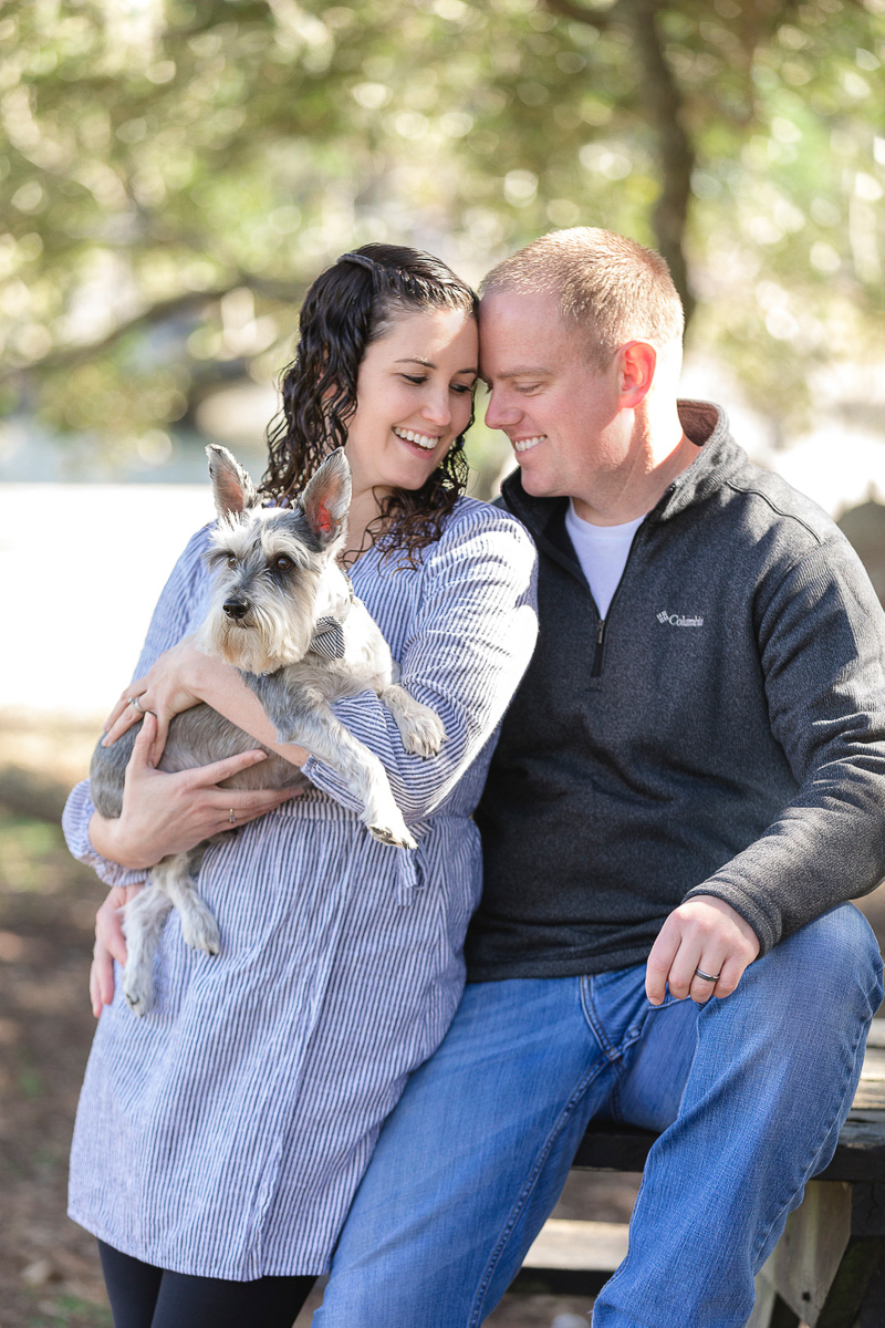 couple holding mini Schnauzer | © Charleston Photo Art 