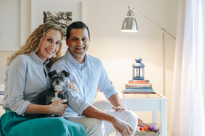 couple and their Shih-Tzu mix, in home photography session | ©Charleston Photo Art