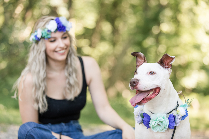 dog photography ideas, cute mixed breed and woman wearing matching floral wreaths | ©Limelight Entertainment