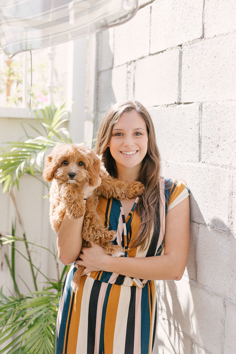 woman holding her dog, pet-friendly lifestyle photography | ©Jasmine Marie Photography