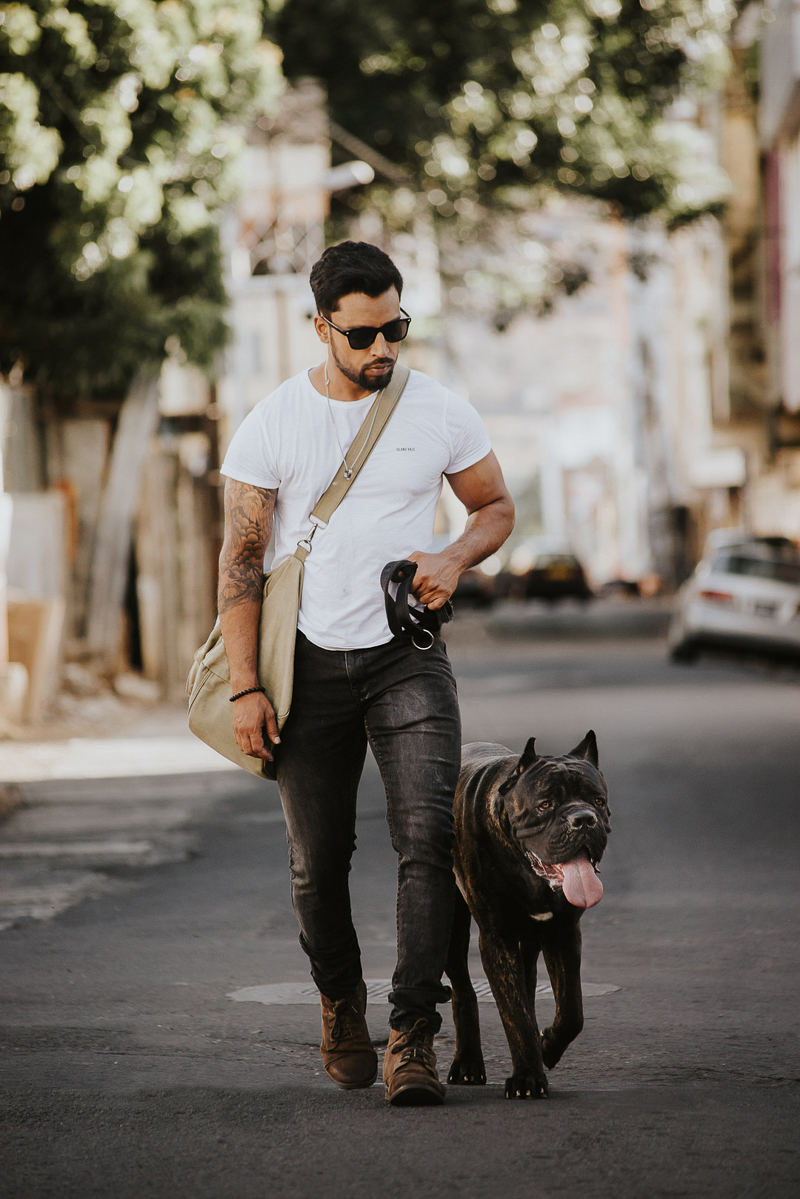 man and Cane Corso walking in the street, Cedric D Vincent Photography | Mauritius fashion photographer